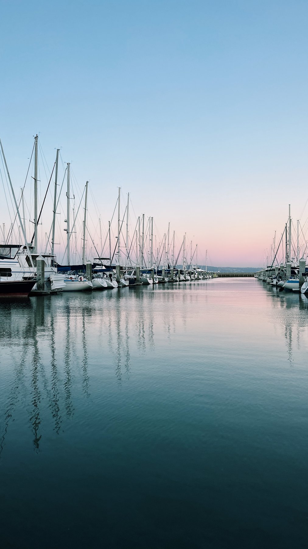 marina channel at twilight, symmetric reflections